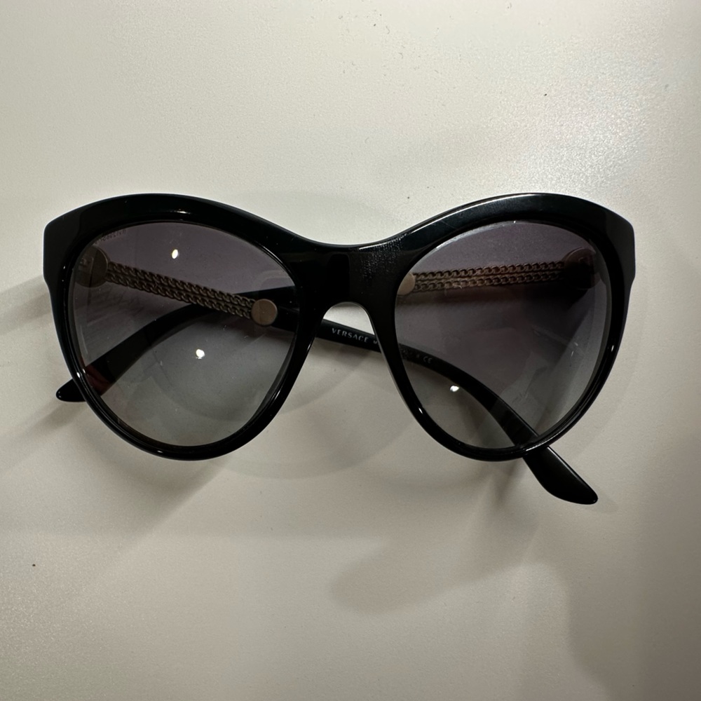 Versace black and gold  sun glasses